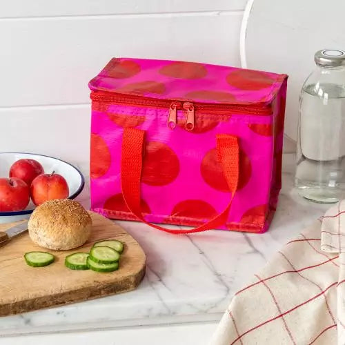 Spotlight red on pink insulated lunch bag