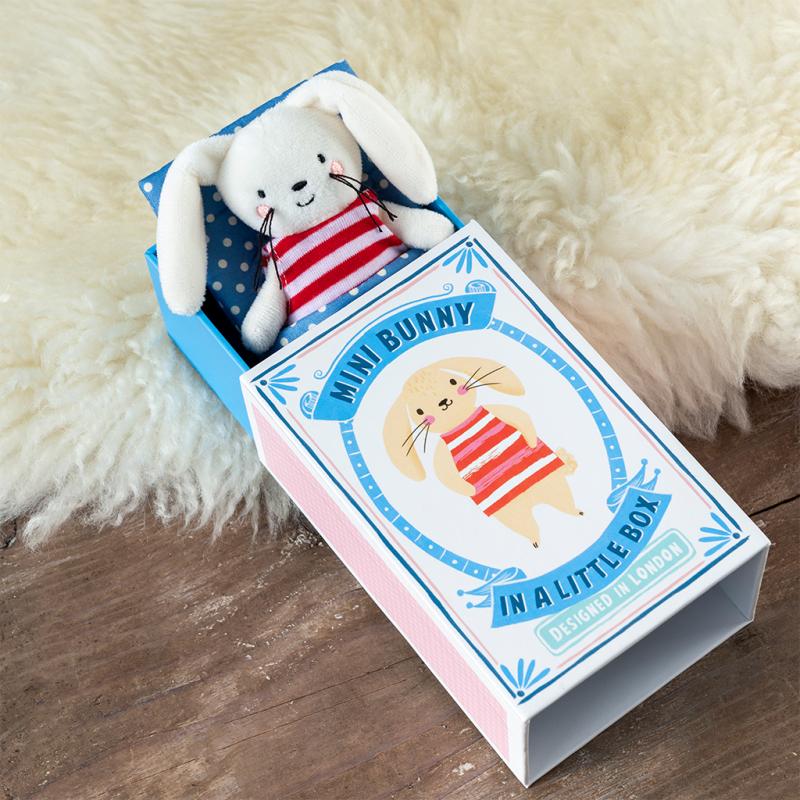 Slightly opened matchbox with Bunny Teddy coming out the top. 