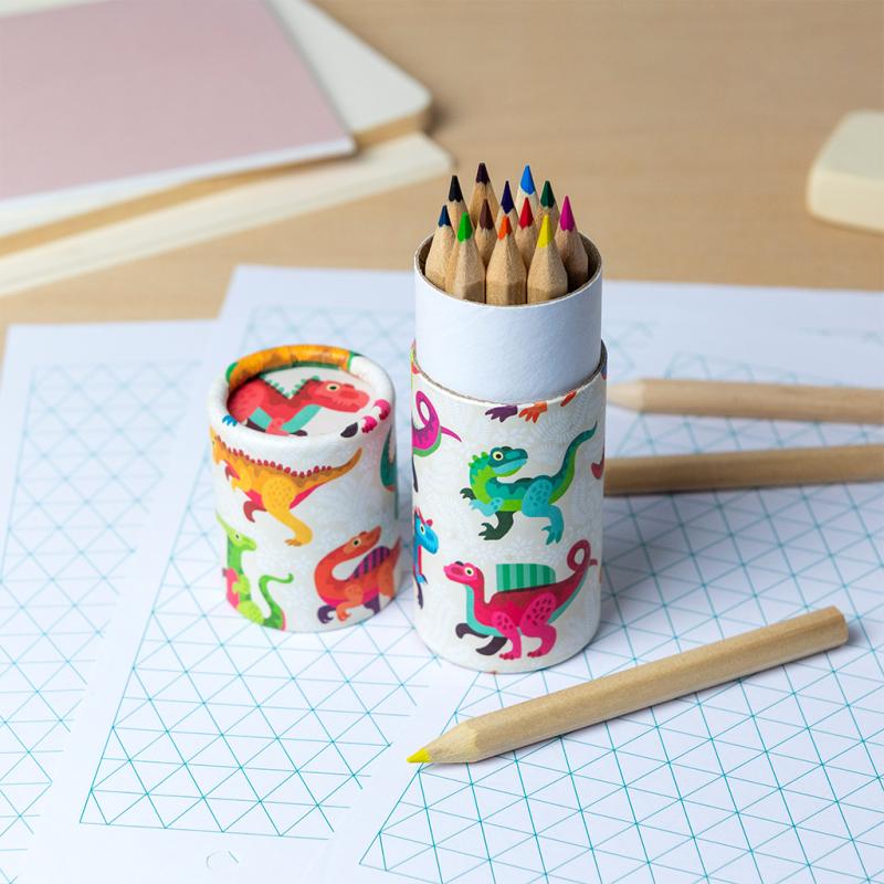 Open pack of colouring pencils in a wooden tube with a colourful dinosaur print.