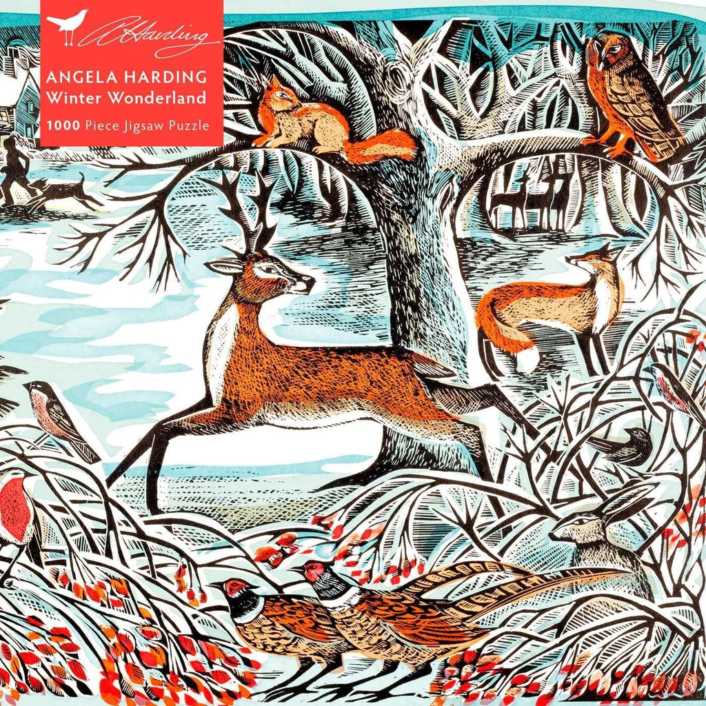 Jigsaw puzzle packaging with a winter scene featuring animals and Angela Harding branding.
