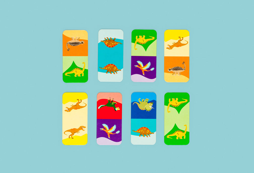 Set of colorful card illustrations with dinosaurs on a blue background