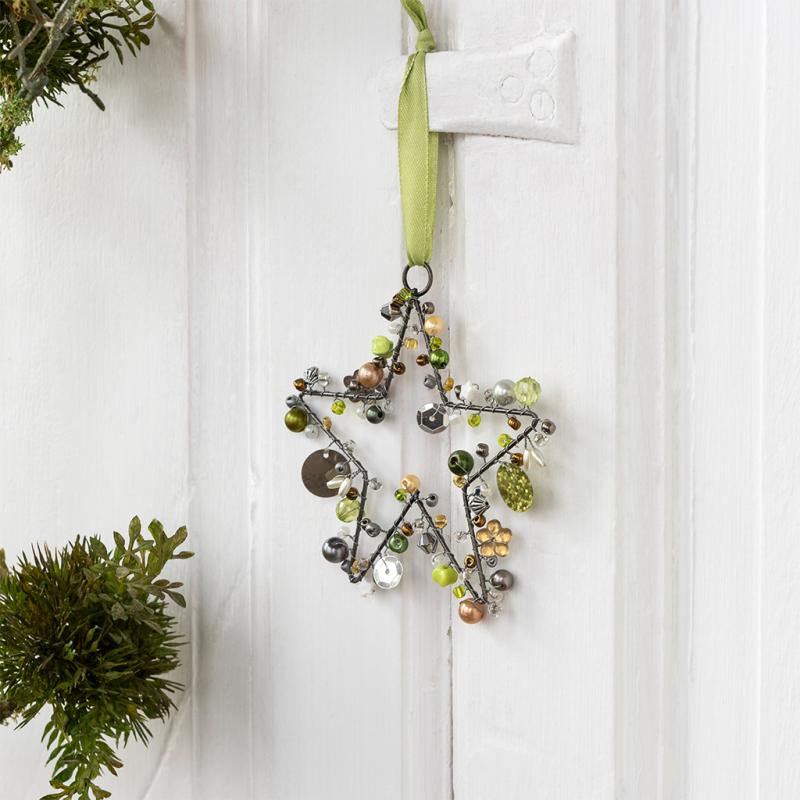 Green handmade beaded star decoration - NSPCC Shop