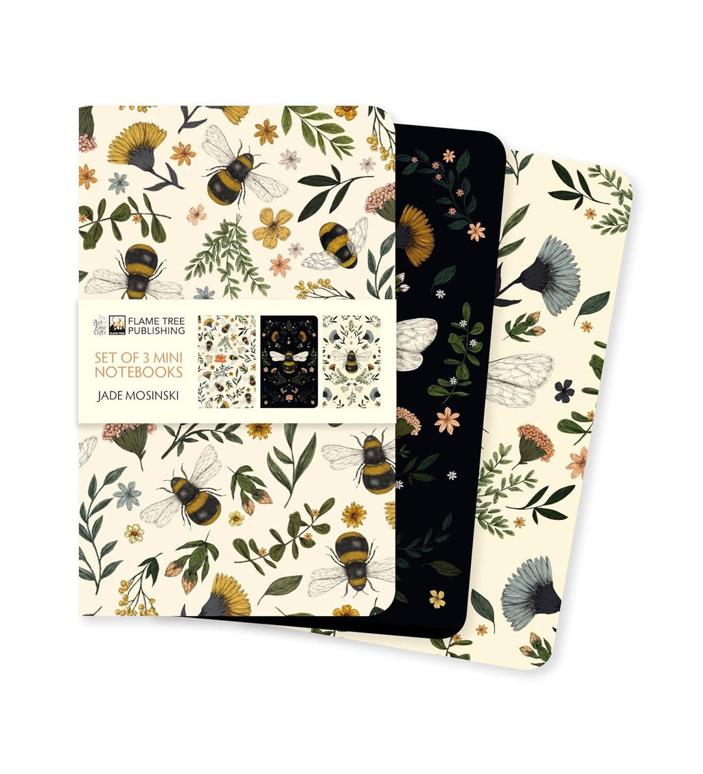 Set of three mini notebooks with floral and bee designs on a white background
