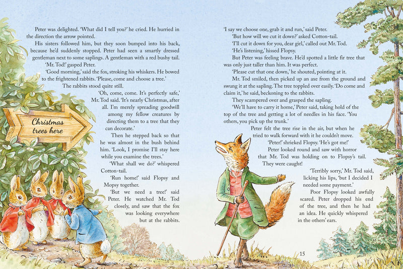 Illustrated book page with fox and rabbits, Christmas theme, and text.