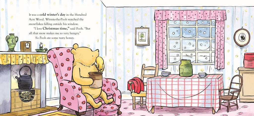 Illustration from Winnie The Pooh A Snowman for Christmas of Winnie the Pooh sitting on a pink chair in a cosy room with a window and table.