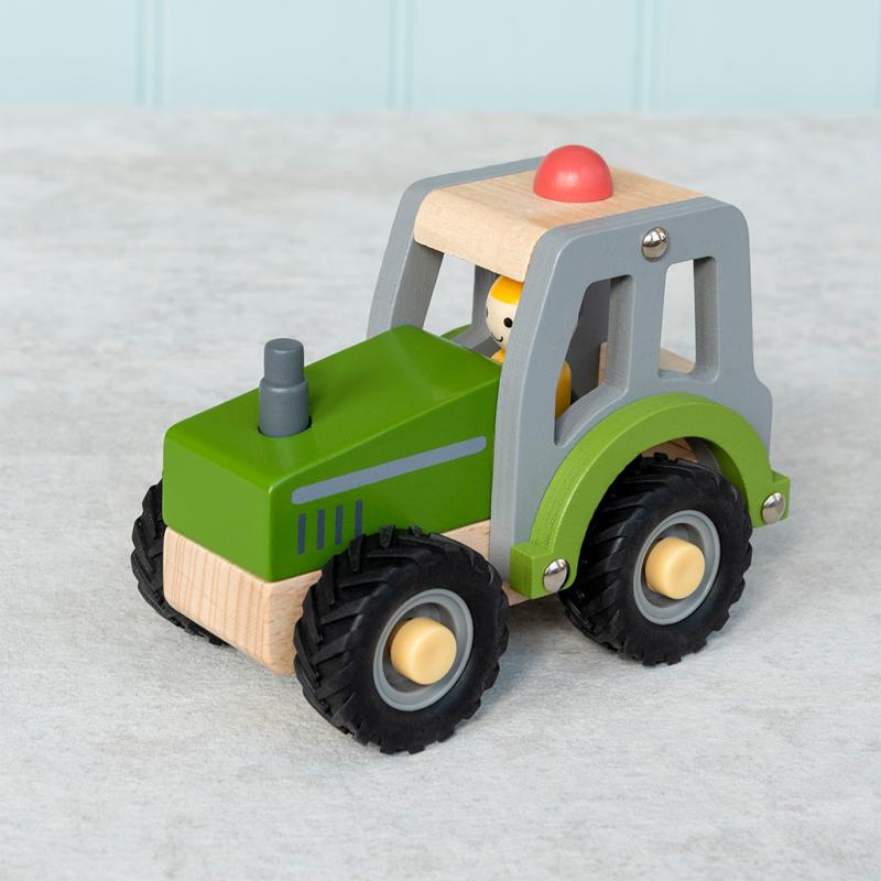 Wooden tractor push along toy NSPCC Shop